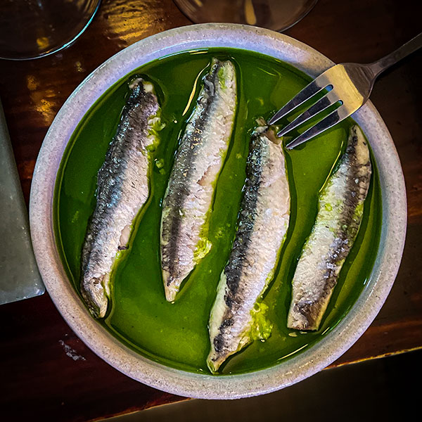 Delicious anchovies (boquerones) in a green sauce at Alma restaurant