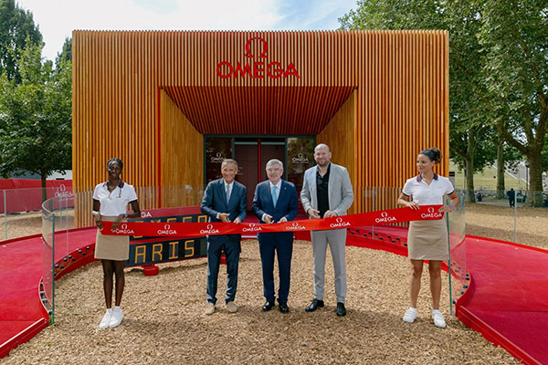 The entrance of OMEGA Pavillon with Raynald Aeschlimann, President and CEO of OMEGA, Thomas Bach, President of the International Olympic Committee, and Alain Zobrist, CEO of OMEGA Timing