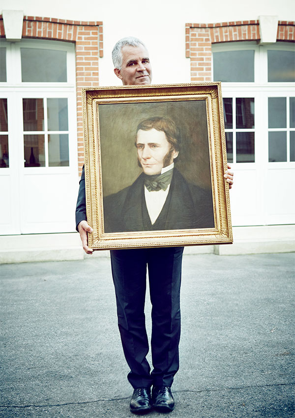 Olivier Krug with the portrait of Joseph Krug, founder of the Maison.