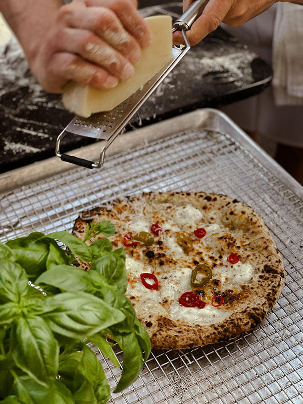 A pizza from Elena restaurant - High-end restaurants to celebrate the holidays