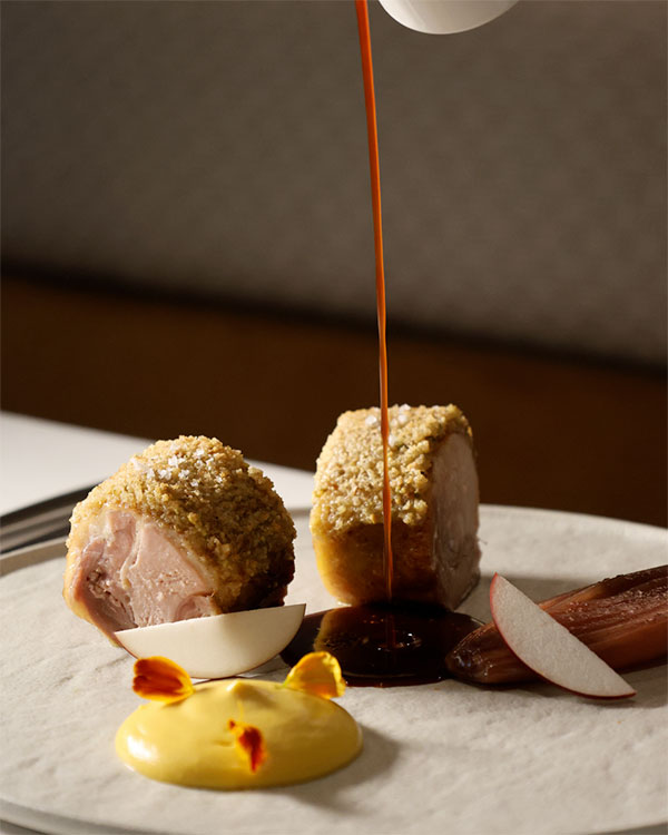 Guinea fowl from Saint-Georges Besnier Farm with pistachios, shallot confit, squash and Québec apples