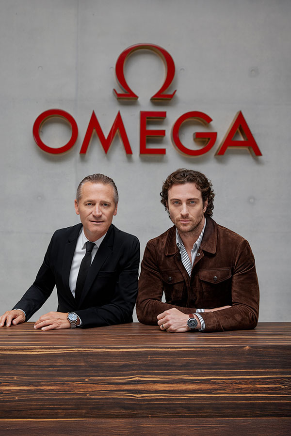 Aaron Taylor-Johnson and OMEGA CEO Raynald Aeschlimann