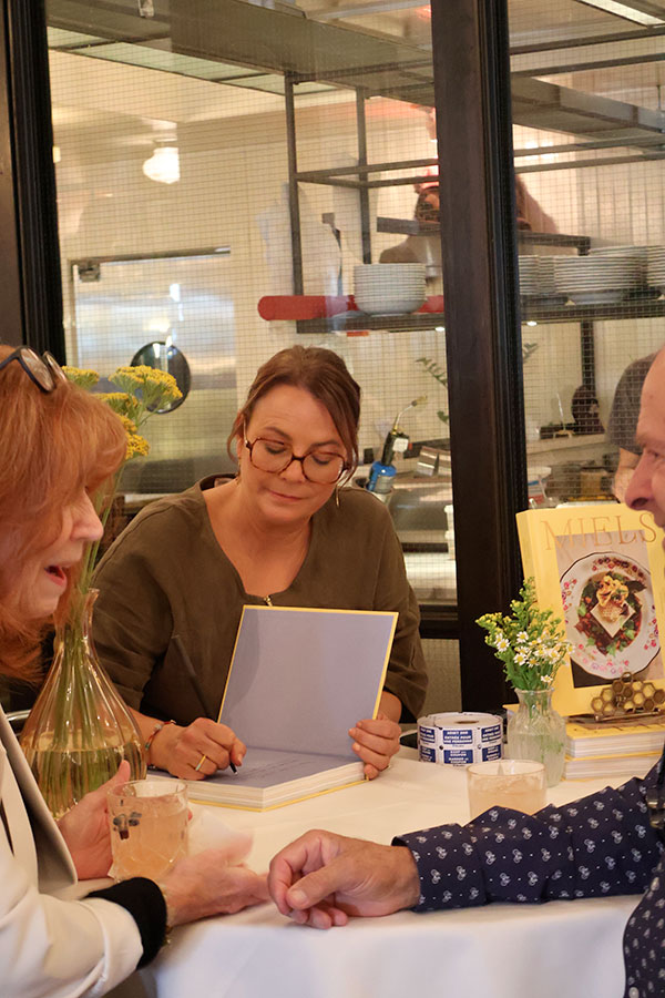 Anne-Virginie Schmidt at the signature session for her book MIELS at Montréal Plaza restaurant