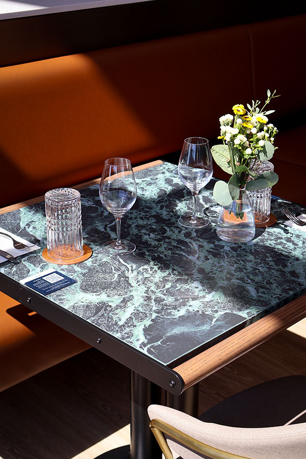 One of the table of the Aspire Amex Lounge at YUL Montréal-Trudeau International Airport