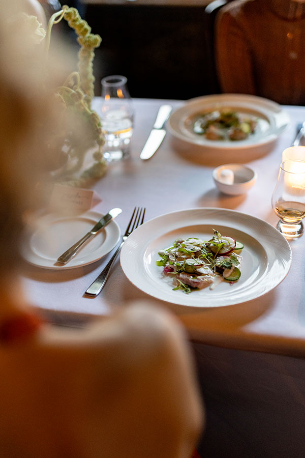 Hamachi crudo with coconut, marinated jalapeño, Lebanese cucumber, red onion, and mint oil, paired with Glenfiddich 14-year-old
