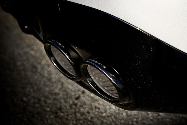 The dual exhaust tips of the 2026 Mercedes-AMG E 53 HYBRID Wagon leave no doubt about its power