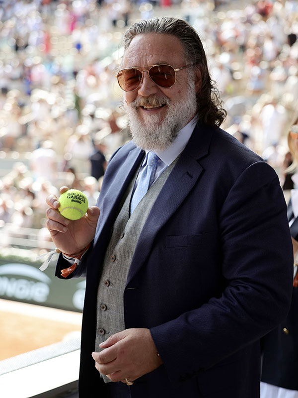 Russell Crowe in a three-piece suit at Roland-Garros