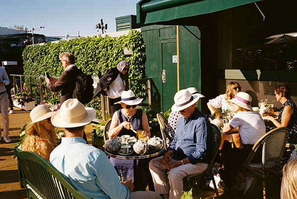 Tennis fans waiting for the next match at Wimbledon
